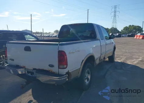 2000 Ford F150 из США, поврежденный, VIN 1FTRX18W3YNA85996